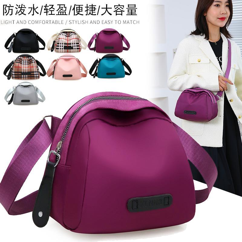 女包2021新款潮時尚百搭牛津布大容量貝殼包輕便單肩斜挎包運動包