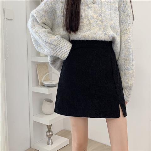 Women's skirt 2021 autumn and winter anti-exposure short skirt high-waisted retro corduroy slit A-line skirt slimming hip skirt
