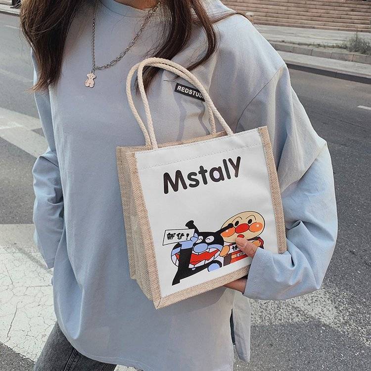 网红韩版手提包可爱简约包零食包女学生包便当包卡通包收纳袋搞怪