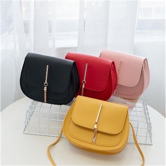 new one-shouldered diagonal cross small round bag
