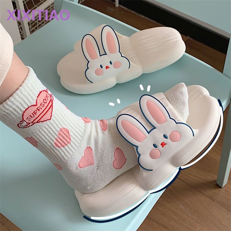 Thin strip cute rabbit slippers female summer feeling of stepping on feces soft thick bottom girls heart non-slip home bath sandals ins