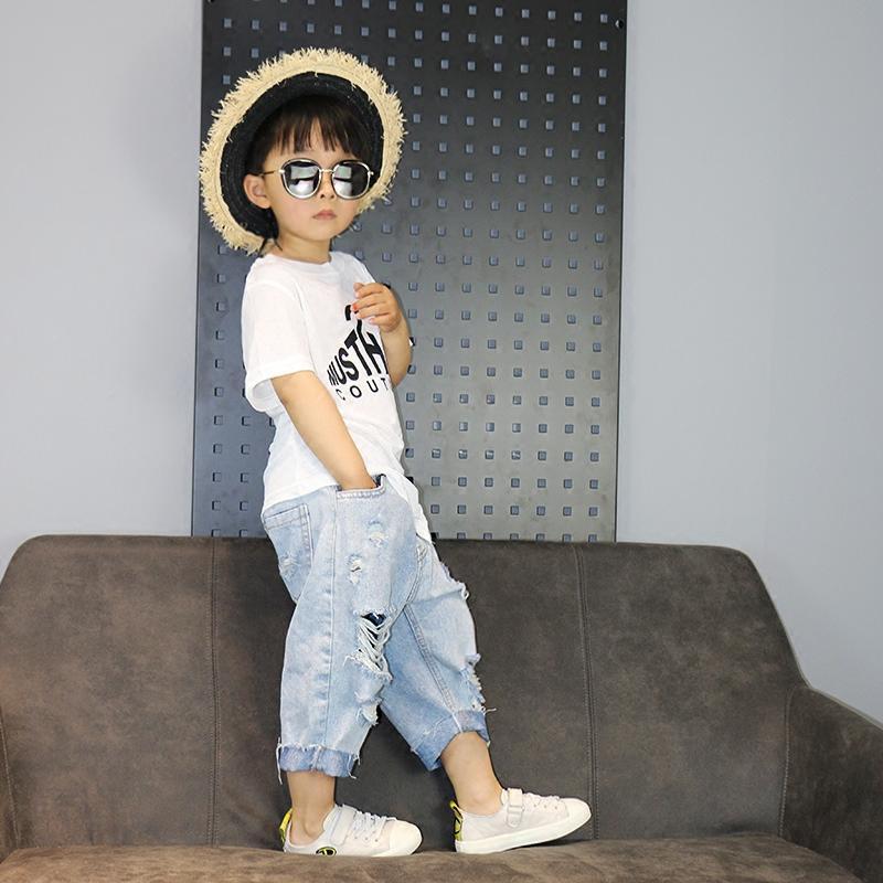 Ripped jeans thin section 2023 summer children's baby Korean version cropped pants boys and girls beggar daddy shorts trendy