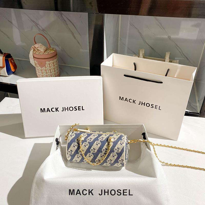 香港MackJhosel真皮質感圓筒包2023新款小金球鏈條小圓包斜挎包女