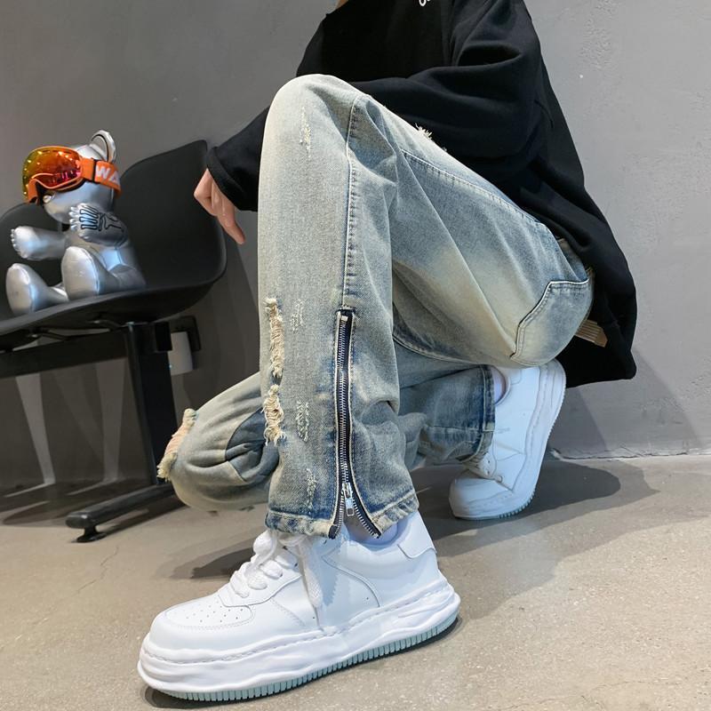 Ripped jeans female niche design European and American BF high street vibe style American style slit ins zipper pants tide