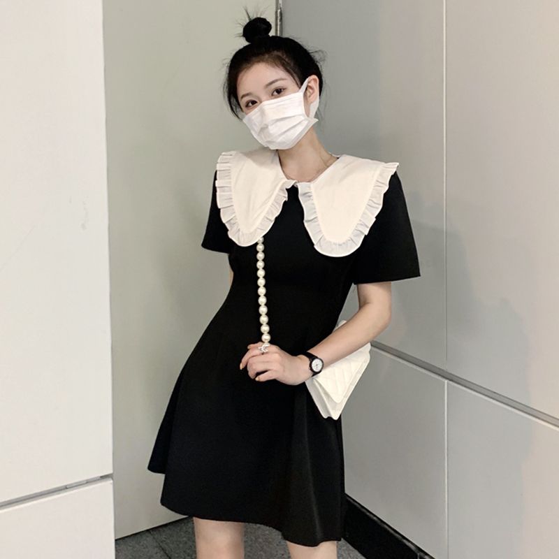 Black doll collar puff sleeve dress female summer 2022 new French sweet small waist short skirt