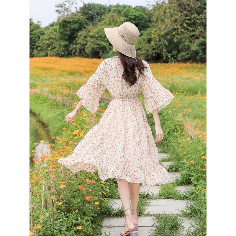 French fairy skirt long skirt 2023 spring and summer new floral floral over-the-knee long section meat-covering trumpet sleeve dress trendy
