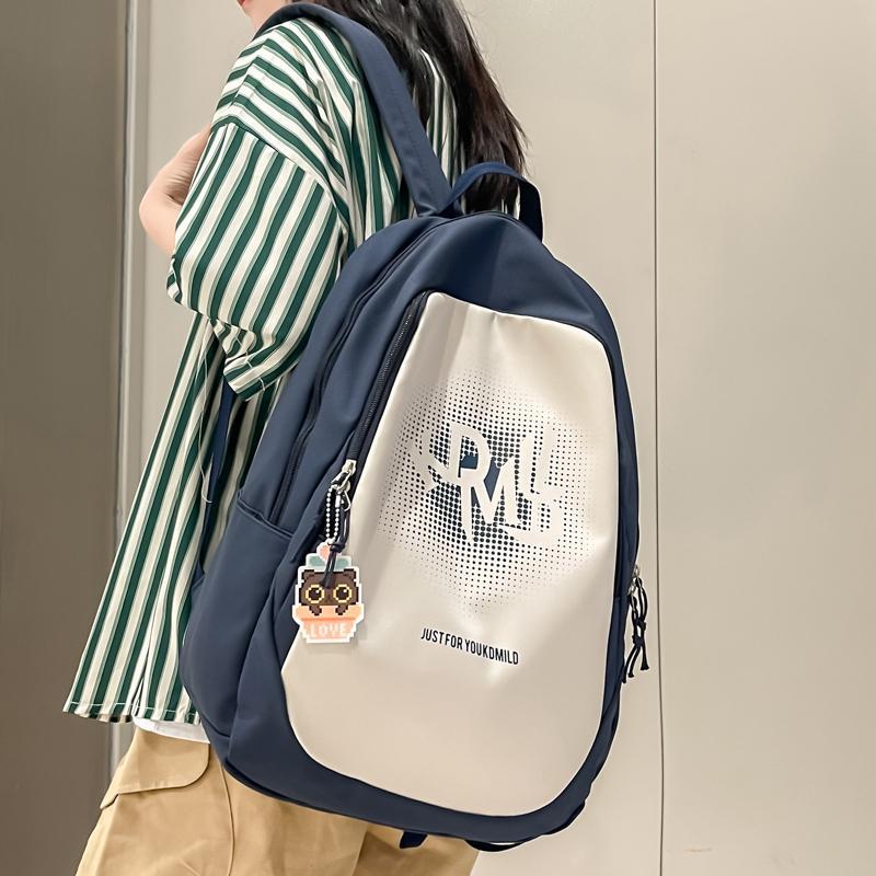 Large-capacity schoolbag female ins wind college student backpack female trend junior high school student high school backpack light travel bag
