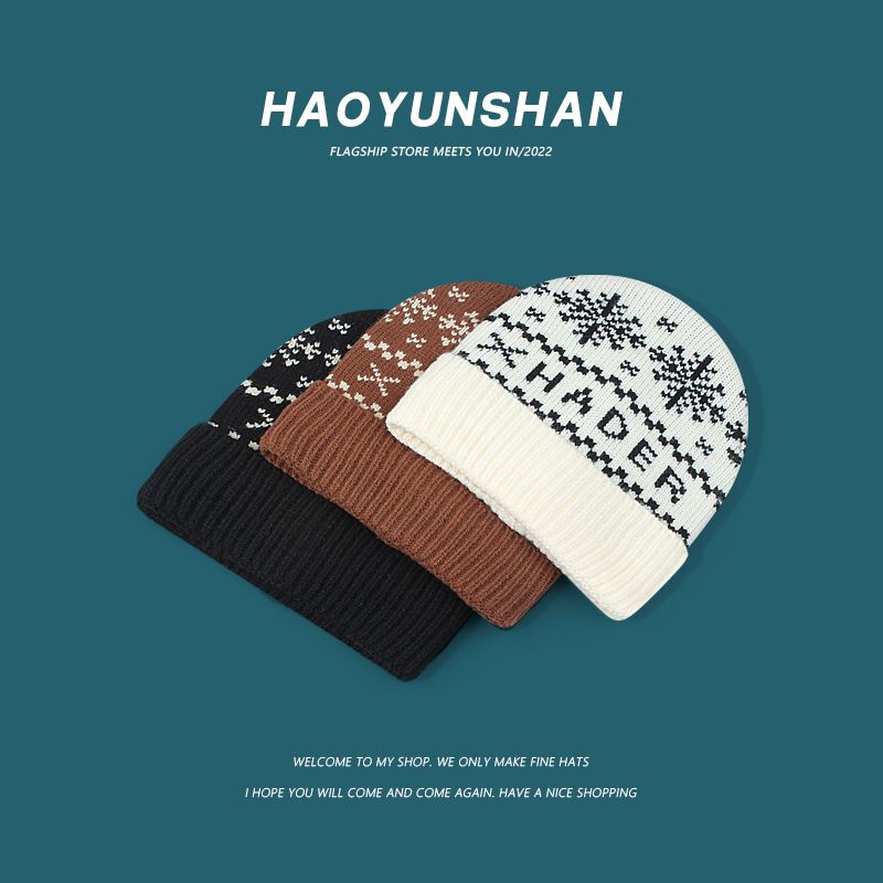 Korean autumn and winter new Christmas snowflake wool hats for men and women warm all-match ear protection caps knitted hat tide