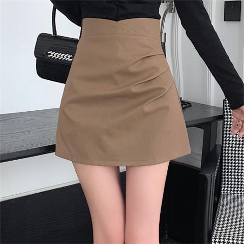Black leather skirt skirt women's 2022 autumn and winter new high-waist temperament pleated a-line skirt slimming hip short skirt