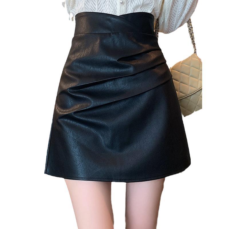 Black leather skirt skirt women's 2022 autumn and winter new high-waist temperament pleated a-line skirt slimming hip short skirt