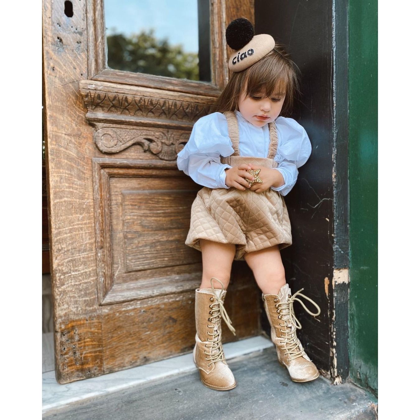 2021 autumn new children's clothing girl's long-sleeved knitted pit top + pressed strap shorts two-piece set