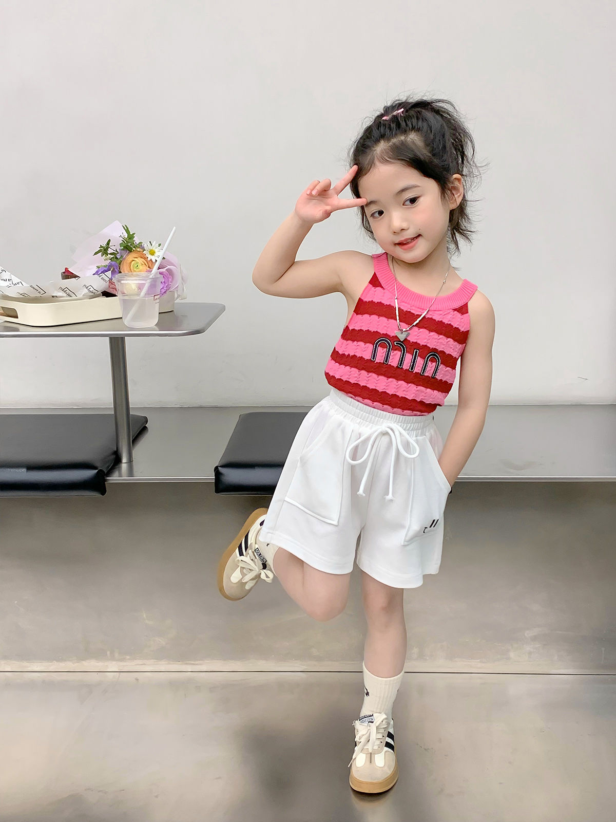 Girls shorts 2023 summer new children's Korean version of smiling sweatpants baby fashion casual five-point pants tide