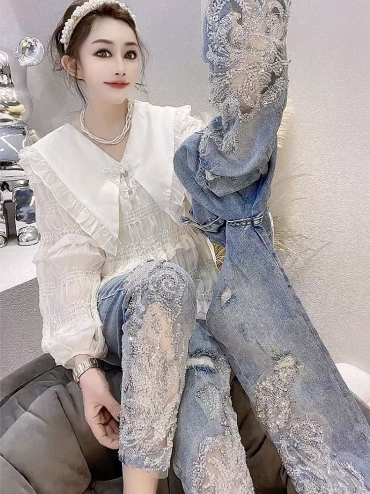 重工鑲鑽亮片鏤空牛仔褲女2023年春夏新款高腰顯瘦破洞小腳九分褲