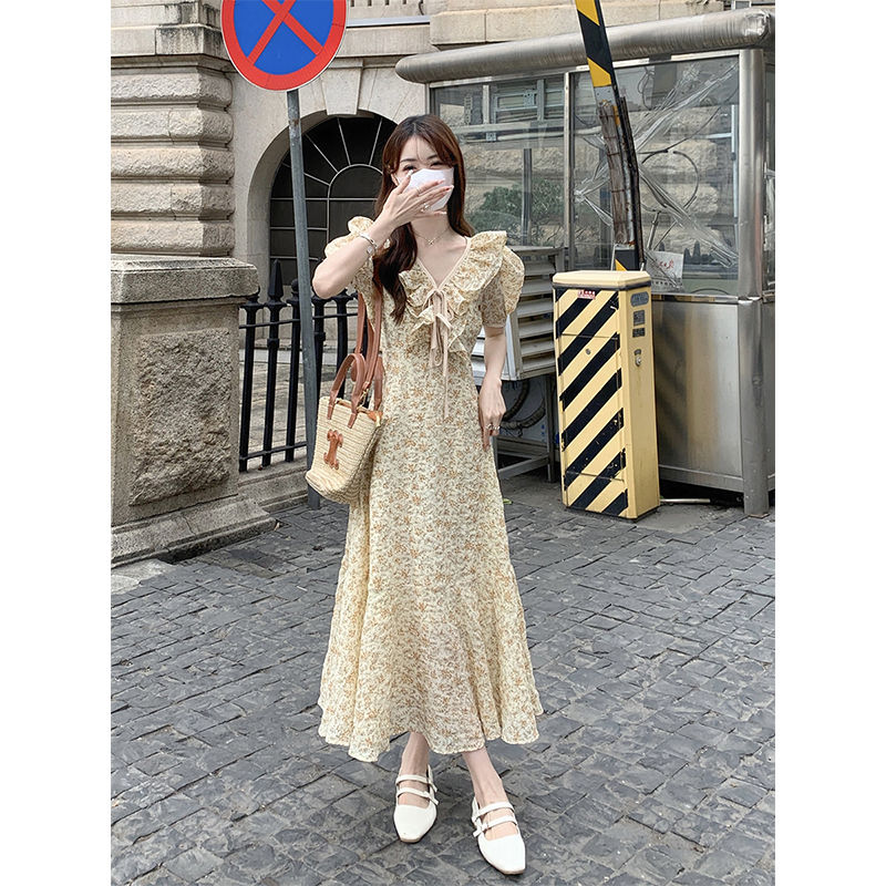 Summer  new French design sense V-neck ruffled ties slim floral bubble short-sleeved dress women