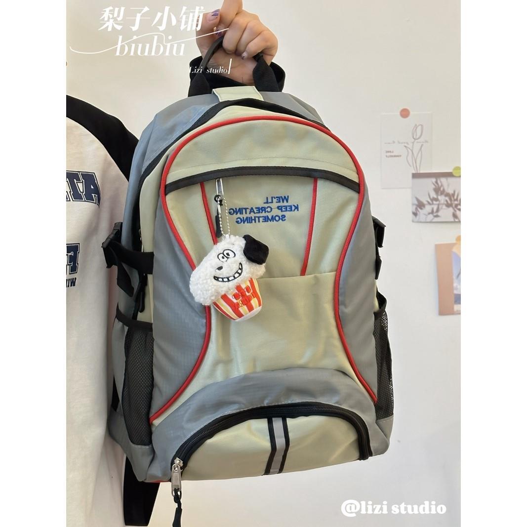 春夏小眾設計美式復古拼色學生書包大容量雙肩包旅行戶外防水背包