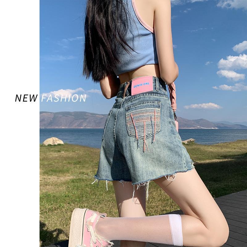 個性牛仔短褲女夏季2023年新款高腰大碼a字小個子毛邊超短熱褲子