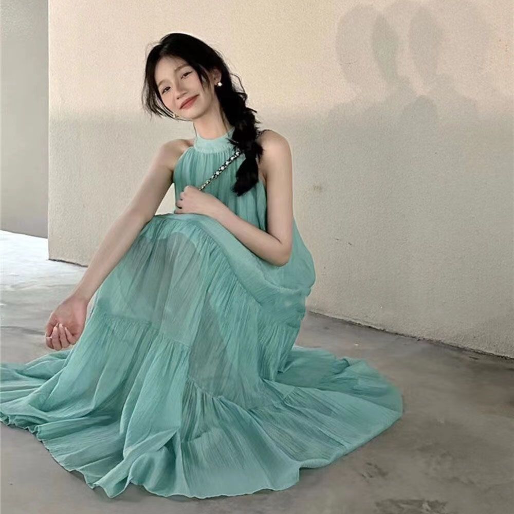 綠色無袖掛脖連衣裙女2023年春季新款氣質溫柔裙子度假風大擺長裙