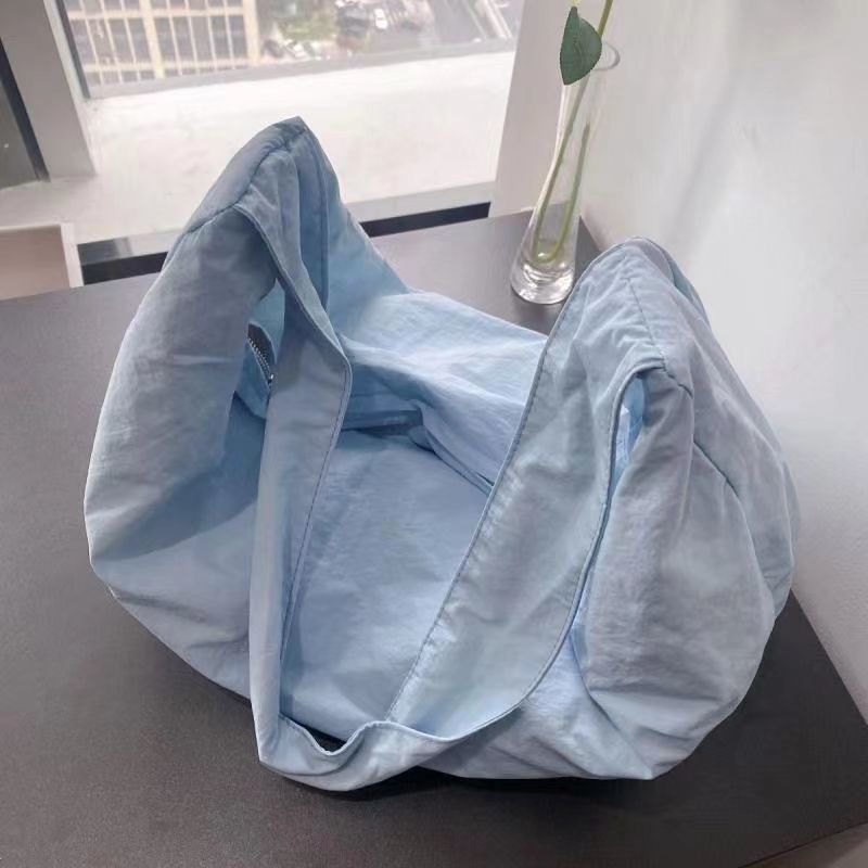 Summer Canvas Dumpling Bag Lazy Style 2023 New niche design Women's Bag Solid Color Versatile Travel Leisure Bag