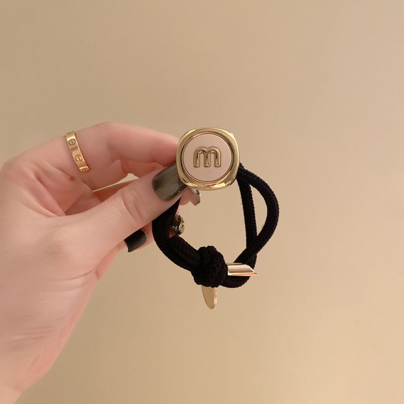 Alta qualità e versatilità, fascia per capelli versatile con lettera 2023 Nuova fascia in pelle di fascia alta, testa per cravatta da donna, corda per capelli fini, anello per capelli_voghion.com