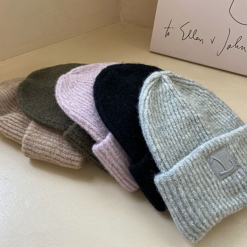 Loose wool knitted hat, simple and fashionable, solid color, cold and warm wool hat, showing a small pile of ear_voghion.com