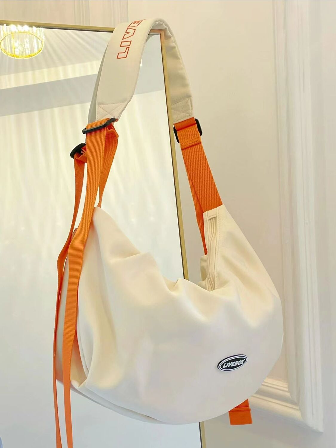 Leisure and sporty youth feeling small shoulder bag 2023, niche vitality orange flavor crossbody bag, casual and versatile shoulder bag