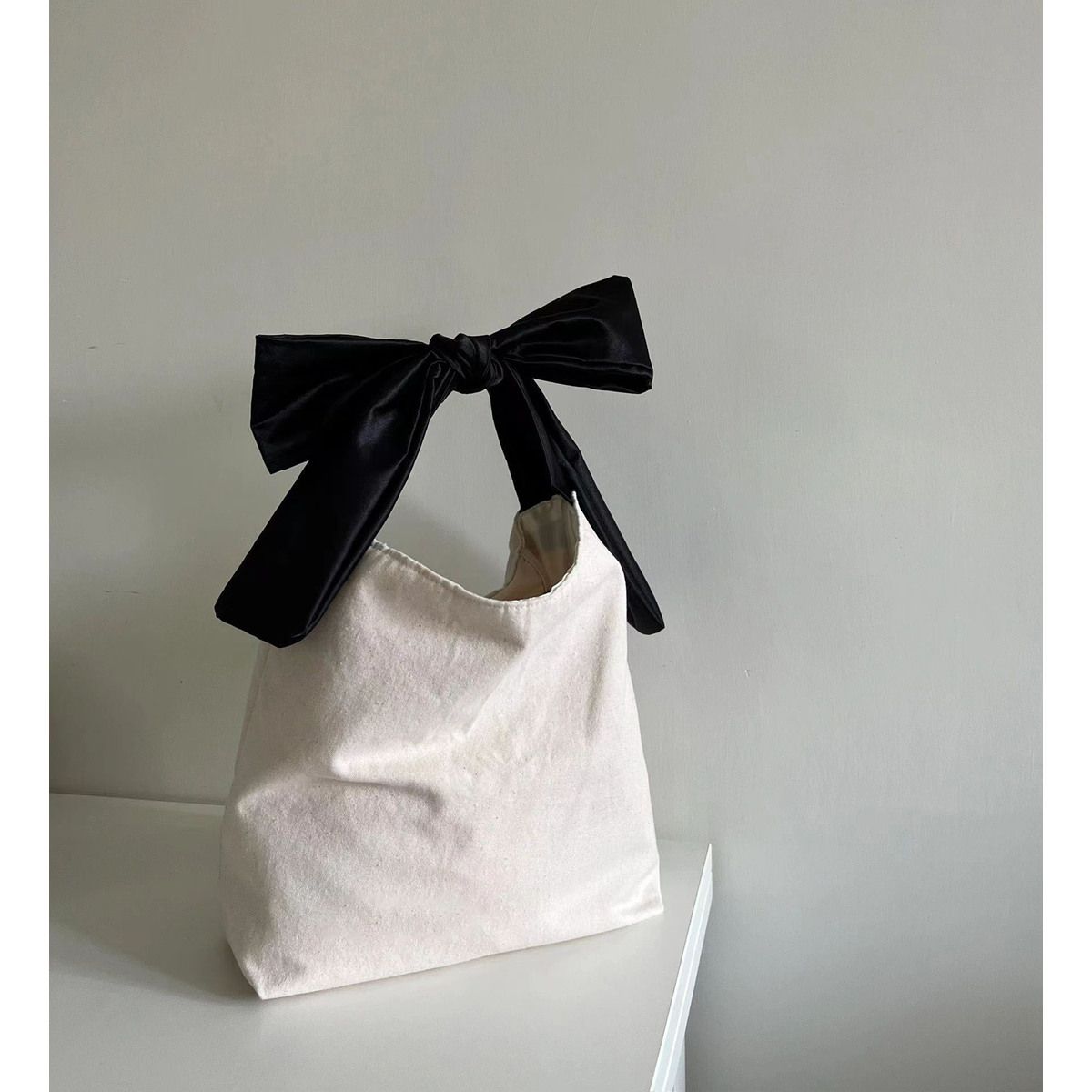 Early Autumn Girls' Bow Tie Bag 2023 New Cute Solid Color Handbag Contrast Color Versatile European and American Underarm Bag for Women