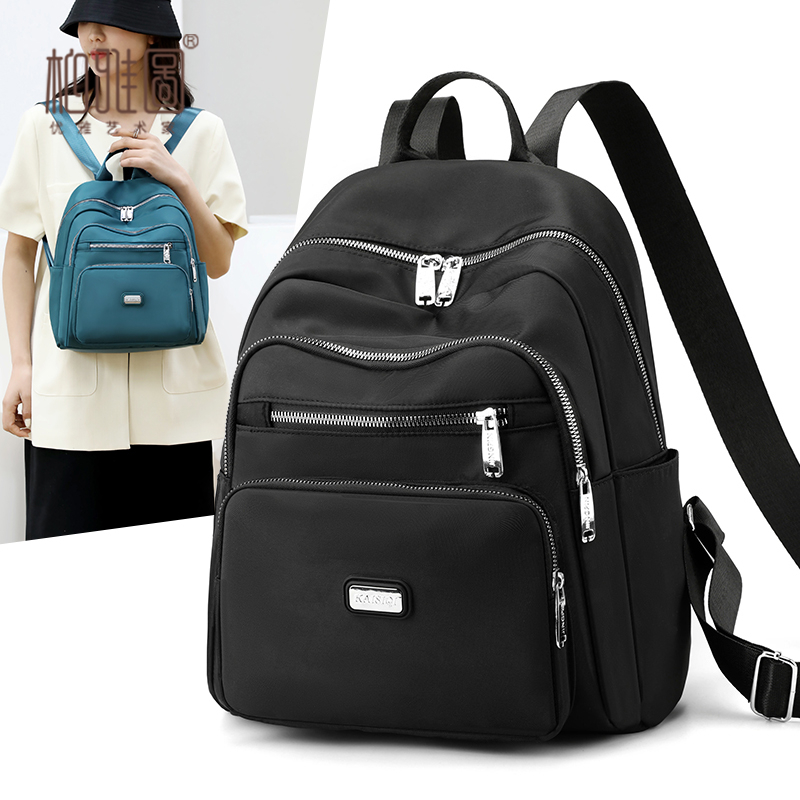多层双肩包2023韩版小型书包女士旅行小背包时尚百搭帆布包