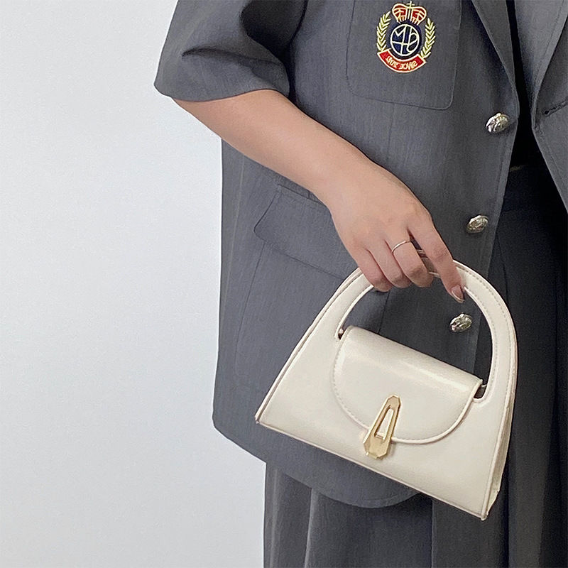 Niche high-end handbag for women  new semi-circle shoulder bag versatile commuter retro lock crossbody bag trendy