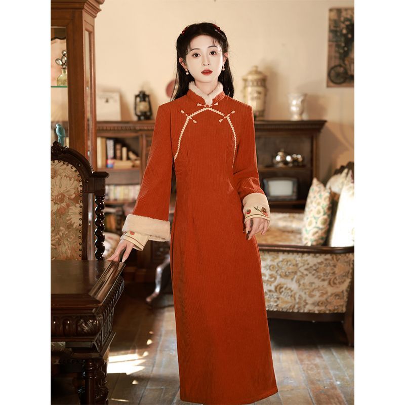 Winter cheongsam 2023 new style young girls autumn and winter long-sleeved thickened warm inverted large-sleeved new Chinese dress