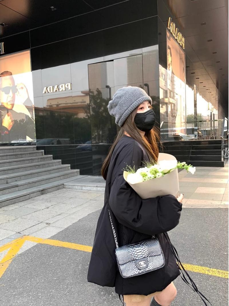 Korean version of loose-fitting women's winter new style high-end, flesh-covering, slimming, fashionable and warm mid-length cotton jacket