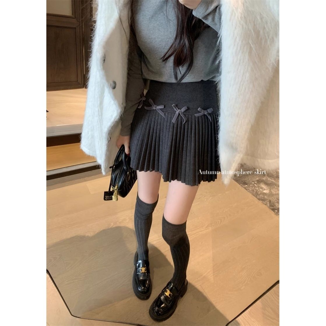 白色半身裙蝴蝶結裙子黑色百褶裙女裝冬季高腰顯瘦A字裙毛呢短裙