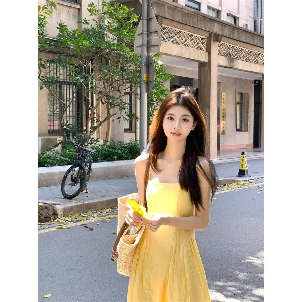 Gentle style yellow suspender dress for women summer French style waist slimming A-line skirt seaside vacation long dress